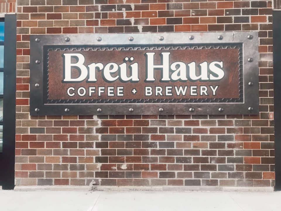 Picture of exterior sign "Breü Haus" on brick wall